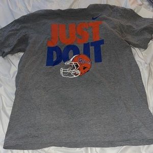 Nike t shirt: gators football team, size large